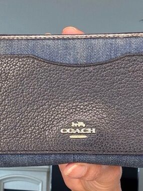 Coach Accordion Long Wallet crafted from blue denim with pebble leather